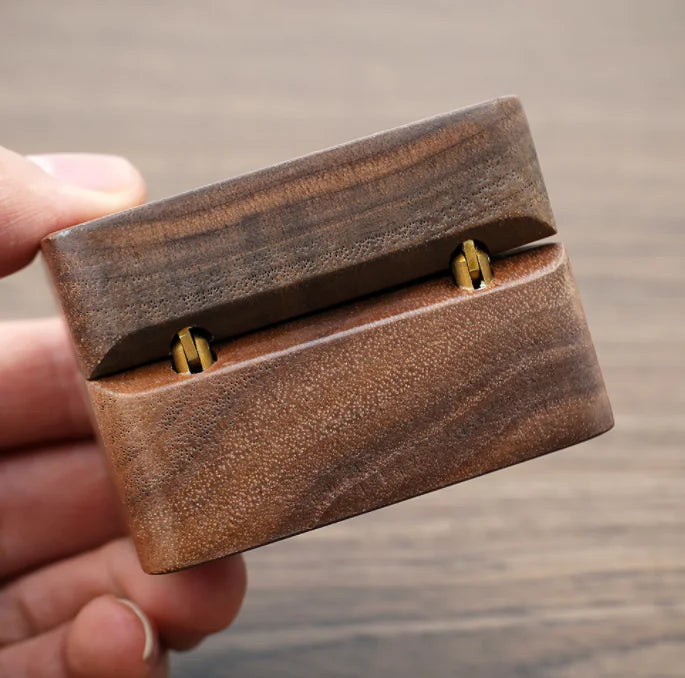 Travel-friendly wooden jewelry box with secure interior