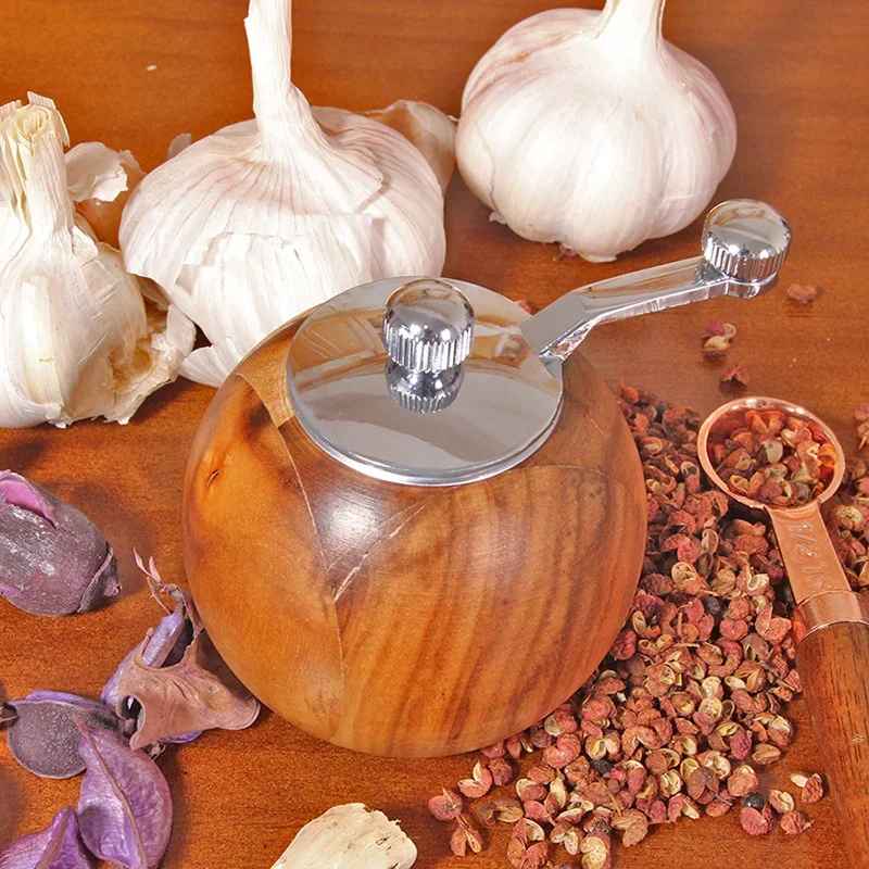 Compact wooden spice grinder with ceramic core